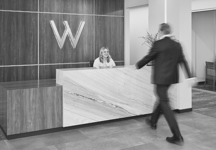 Man walking into Watermark lobby